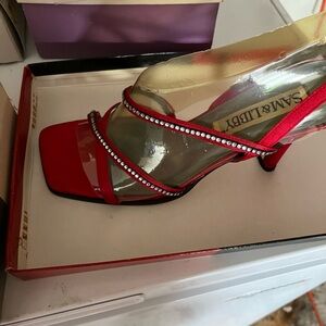 Sam & Libby open toe/heel, red & clear with crystals on thin asymmetrical straps
